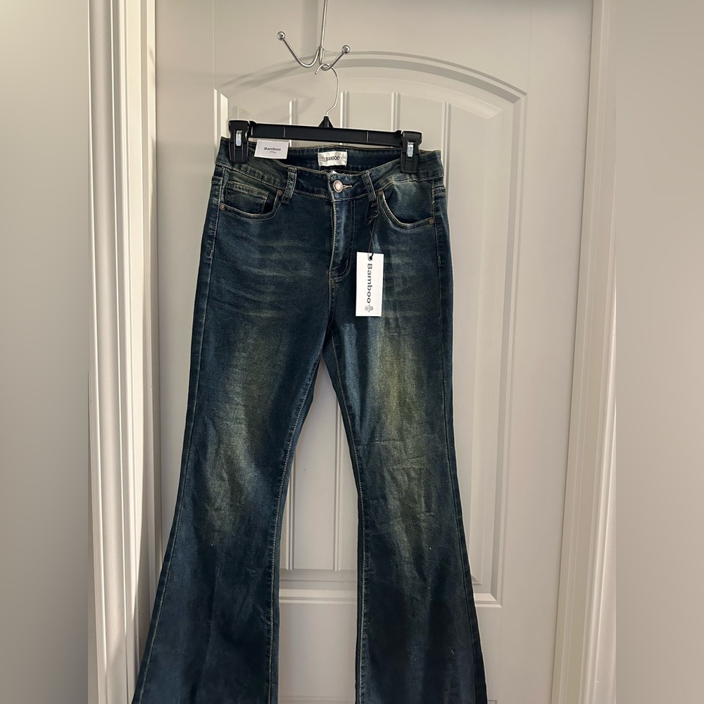 Bamboo, 27 wide leg flared distressed Jean